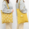 DOUBLE SIDED FRUIT HAND BAG